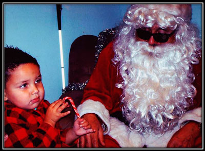 Blind Santa and a blind child